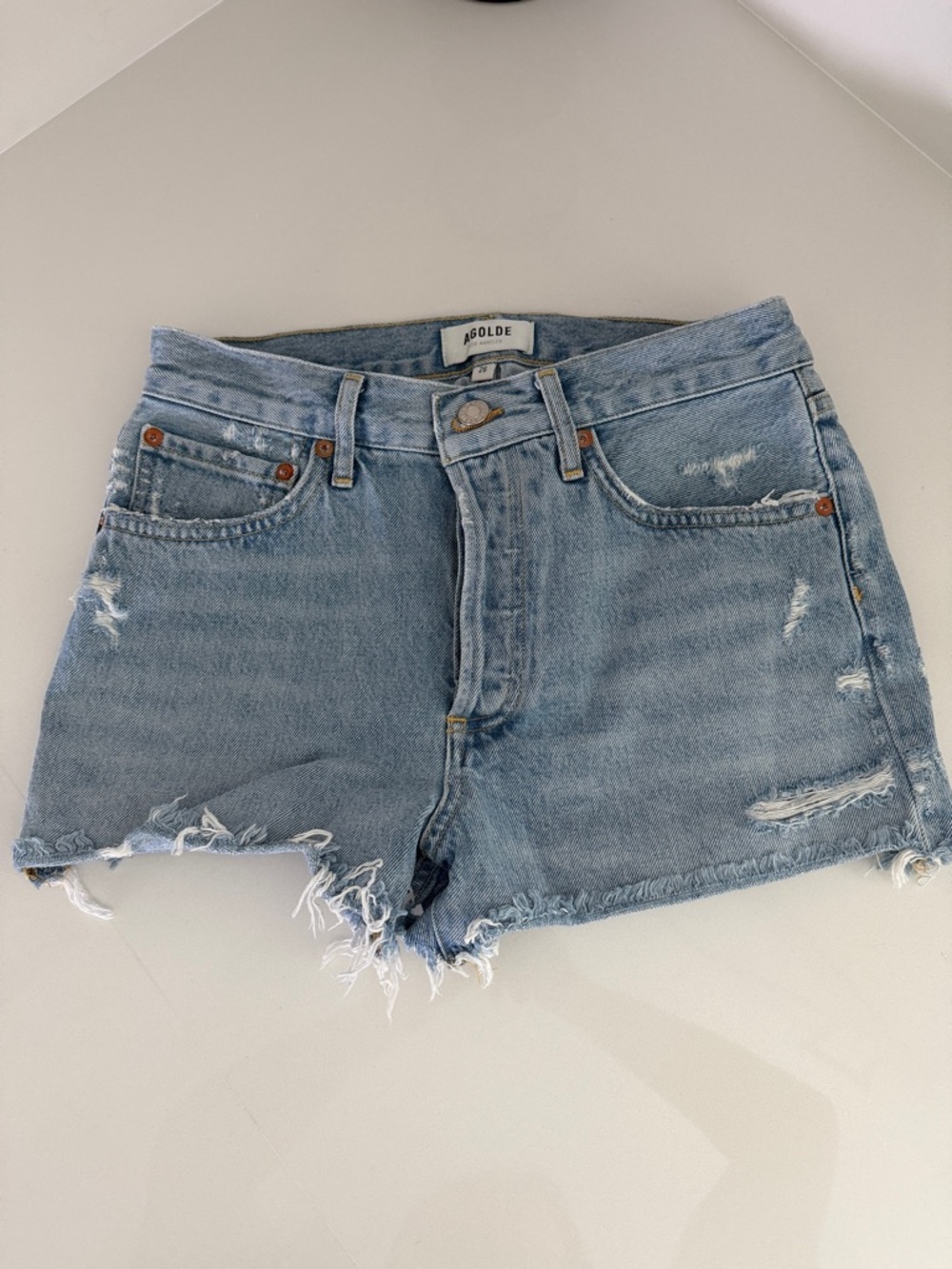 Agolde Light Blue Distressed Denim Cutoff Shorts